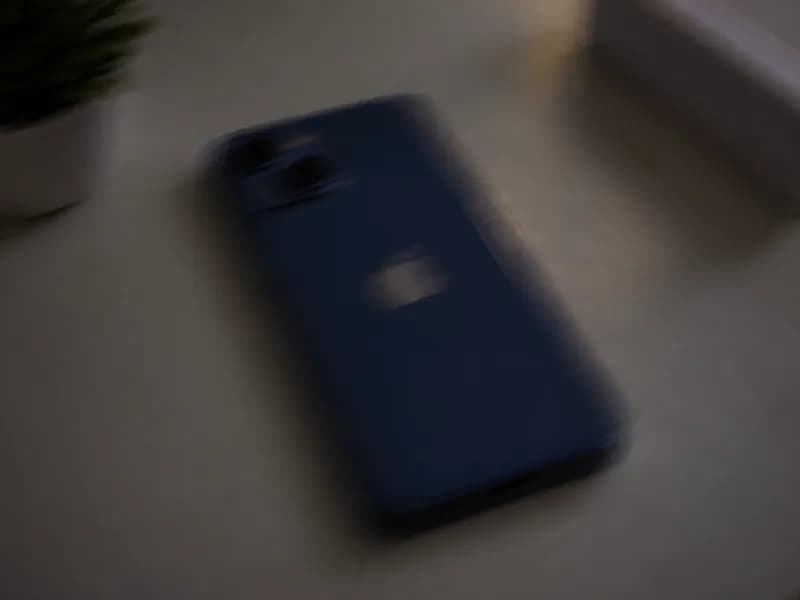 A blurry, dark photo of a phone